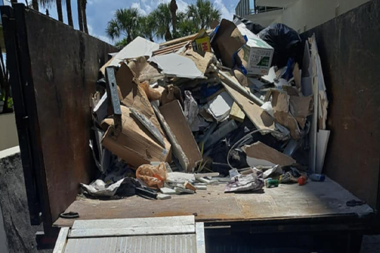 JM Junk Removal truck filled with junk, providing efficient junk removal services in Coral Springs.